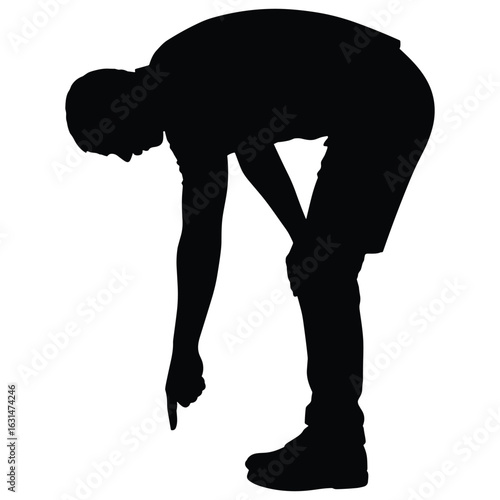Man bending down pointing at the ground silhouette