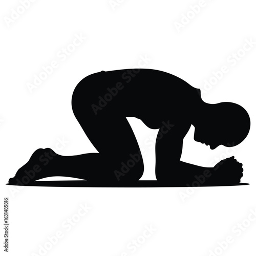 Man kneeling in prayer silhouette