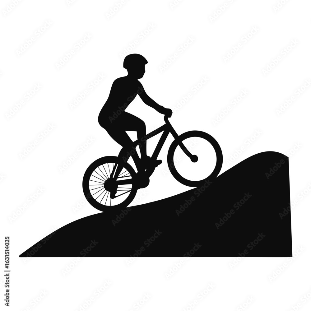 Fototapeta premium Mountain biker riding downhill silhouette