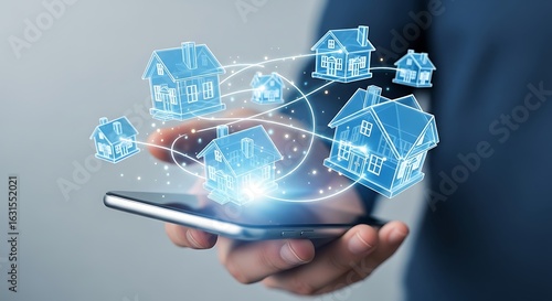 Real estate technology concept showing connected house icons above a smartphone held by a man
