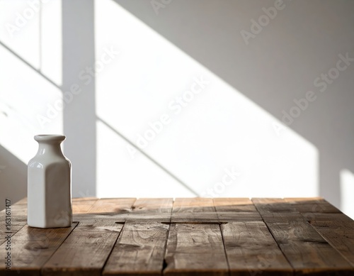 White Ceramic Bottle On Wooden Table With Natural Sunlight And Shadows