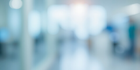 Abstract blur of hospital corridor or clinic interior, bright medical background with light flare for healthcare and science concepts