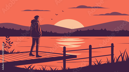 A young man stands on a wooden pier, gazing at a serene sunset over a lake surrounded by mountains.