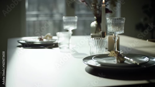 Wallpaper Mural Intimate Dining Table Setup with Elegant Glassware and Candlelight in Bright Indoor Setting Torontodigital.ca