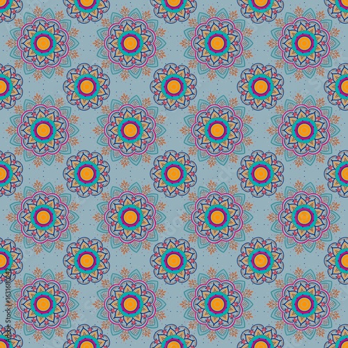 A seamless digital illustration of a vibrant mandala pattern featuring floral and geometric elements. This design blends boho and traditional Asian motifs with bold colors including teal, magenta.