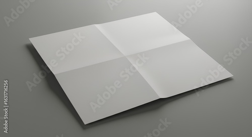 White Folded Paper On Gray Surface