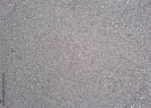 This is a close-up of an asphalt road.