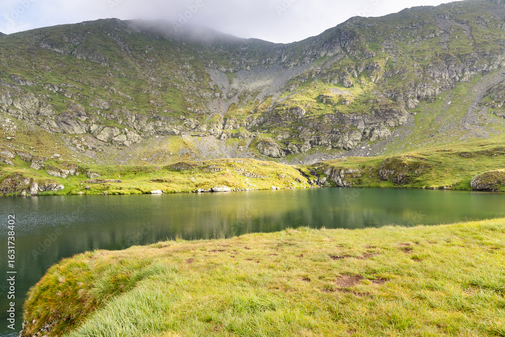 Obraz premium fagaras mountains with Capra lake