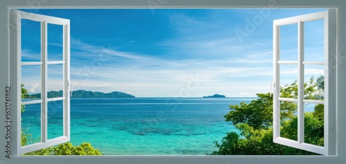 The picturesque ocean view through an open window overlooking a tranquil beach.