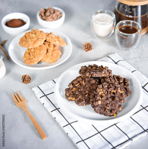 Flat Lay of Homemade Cookies and Coffee with Milk on Gray Table.