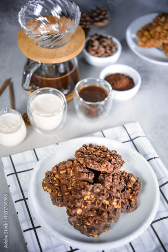 Flat Lay of Homemade Cookies and Coffee with Milk on Gray Table.
