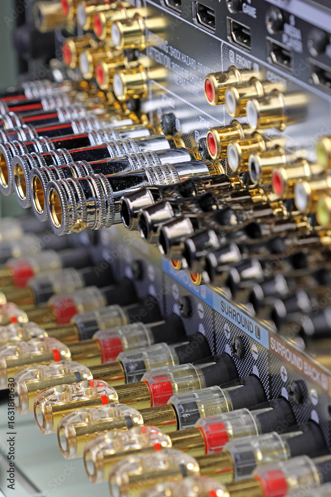 Fototapeta premium Rear panel of a high-quality AV receiver with multimedia connections for connecting speakers, analog and digital signals