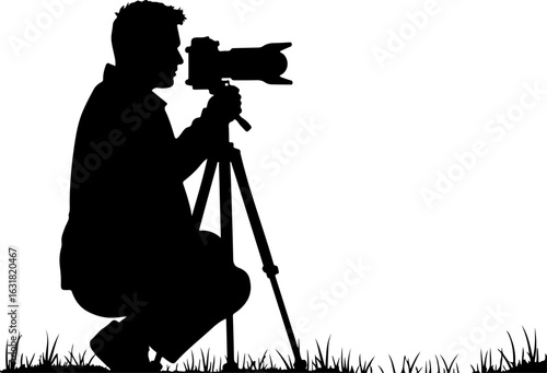 Silhouette of a Photographer with Camera on Tripod in Nature