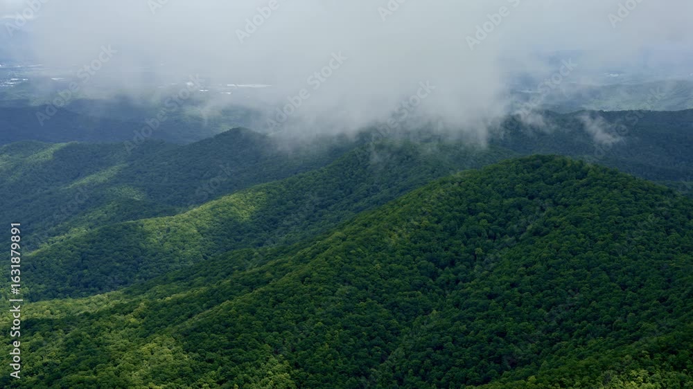 Aerial journey through clouds and rain across the wild ridges of the Smokies. Aerial journey through clouds and rain across the wild ridges of the Smokies.