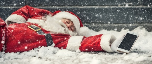 Tired Santa sleeping in snow