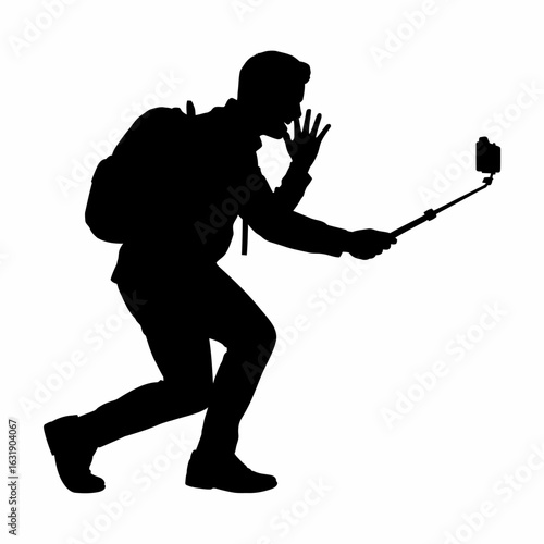 Silhouette of a Man Taking Selfie with Stick
