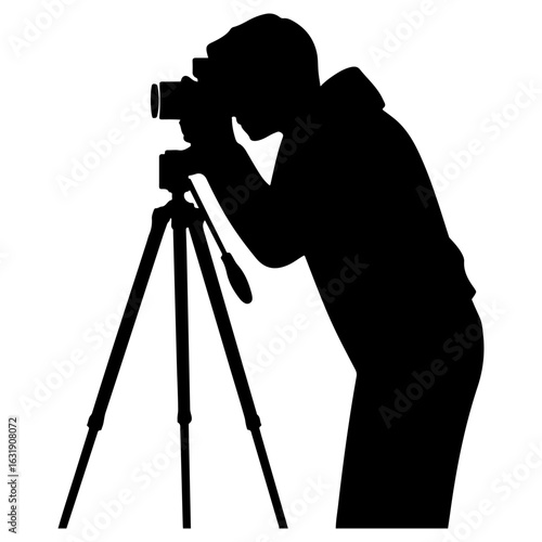 silhouette of a photographer taking a picture