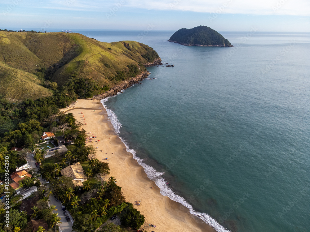 Naklejka premium The incredible tropical beach amidst the green mountains