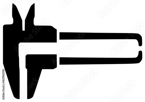 Dyer tool in a garage with metal scraps and a drill press nearby
