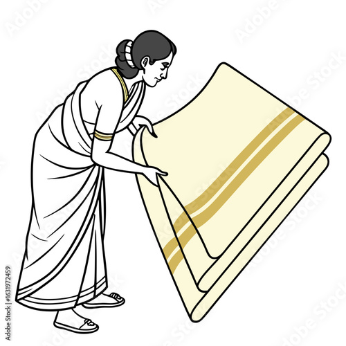 Indian woman in traditional saree carefully folding a cream colored dhoti with golden stripes