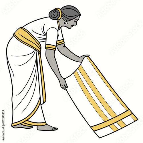 Traditional indian woman in white and gold sari carefully folding a striped textile