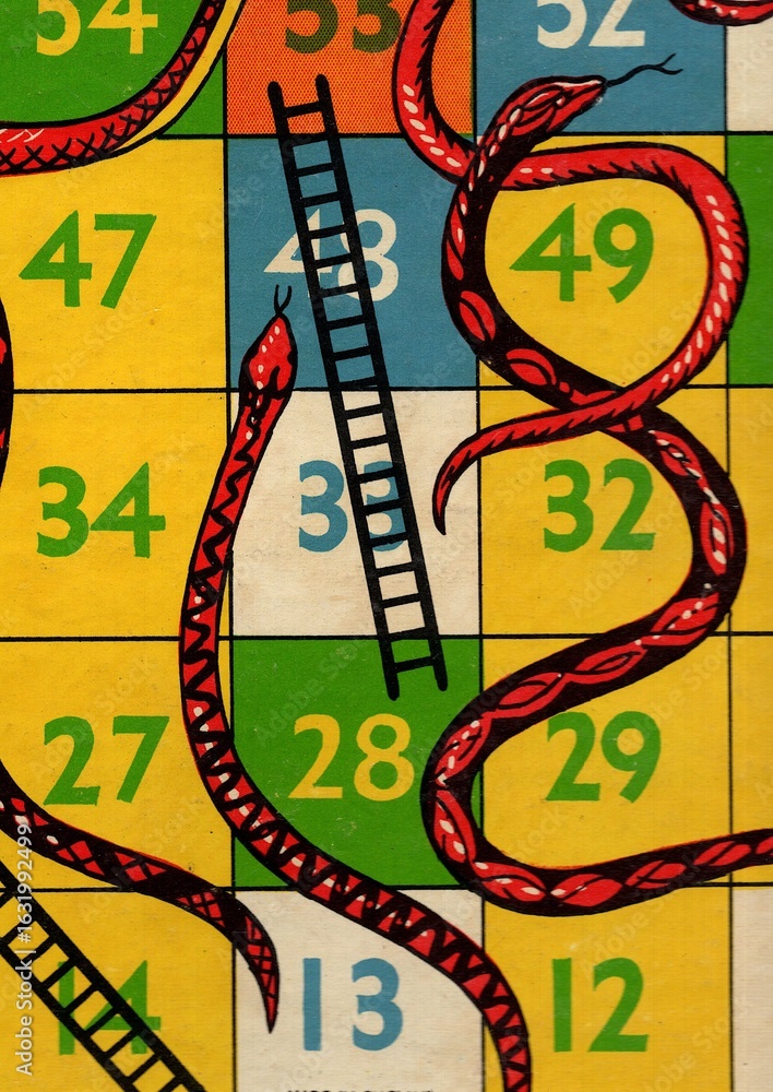 Obraz premium Detail from a vintage snakes and ladders game board.