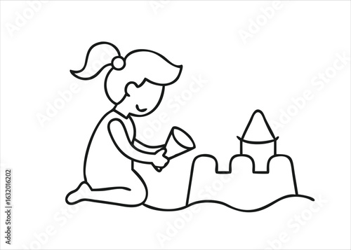 A young child happily engaged in building a delightful sand castle on a sunny beach isolated on white background