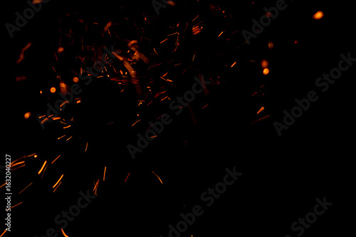 A black background with a lot of fire and smoke