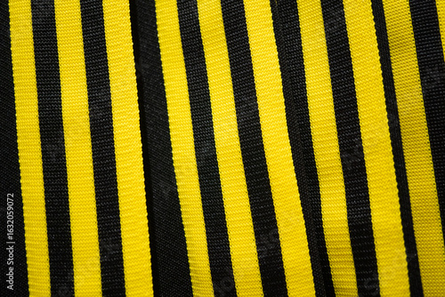 Yellow and black striped fabric pattern
