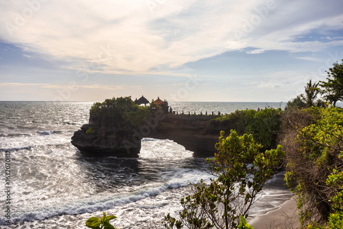 Batu Bolong Beach,Batu Bolong temple at Tanah Lot temple area in Bali island of Indonesia