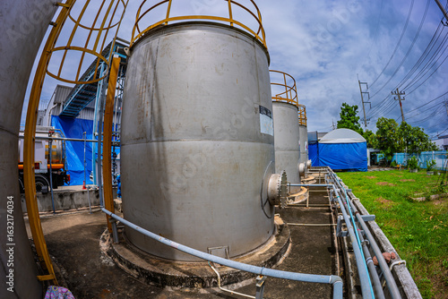 Wallpaper Mural Stainless vertical steel tanks with equipment tank chemical cellar at the with stainless steel tanks cleaning Torontodigital.ca