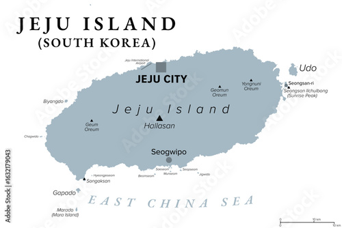 Jeju Island, largest island of South Korea, gray political map, with capital Jeju City, city Seogwipo, and shield volcano Hallasan in its center. Major part of Jeju Special Self-Governing Province.