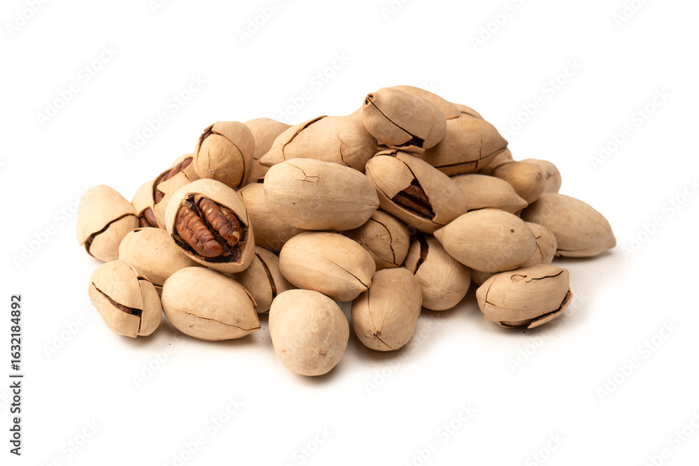 Obraz premium Pecan-nut in a shell isolated on white background. Top view.