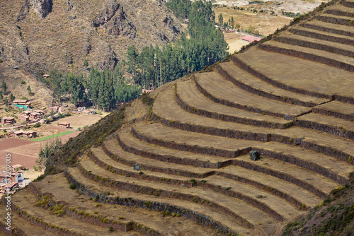 Obraz na plátně Ancient engineering at its finest — the agricultural terraces of Pisac, built by the Incas to master the steep slopes of the Sacred Valley