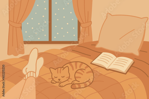 Cozy winter afternoon with a cat sleeping on the bed next to a person?s feet and an open book on a quilt