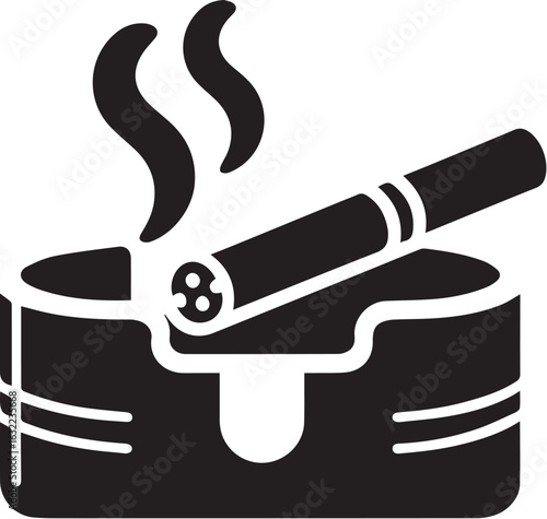 Smoking concept with cigarettes in ashtray and rising smoke