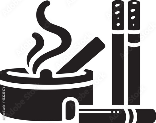 Smoking concept with cigarettes in ashtray and rising smoke