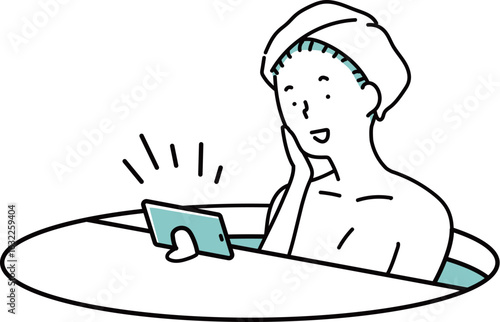 動画を視聴しながら半身浴をする女性_単色