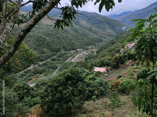 General view of landscape and inside small village with small houses and organized sporadically