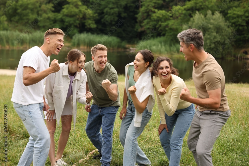 Fototapeta premium Team building. Group of happy people together outdoors