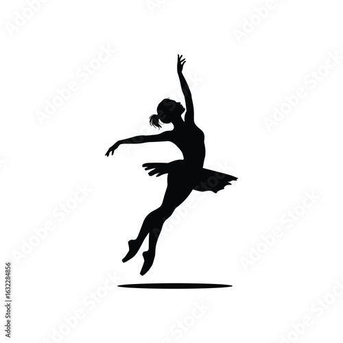 Silhouette of a ballet dancer in mid air leap