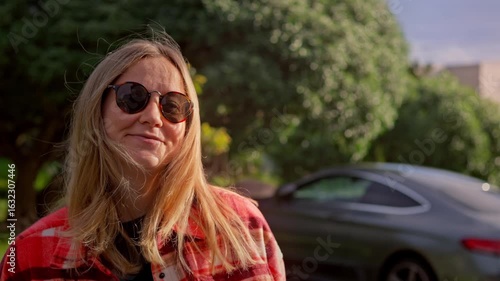Woman Putting On Sunglasses Stylish Summer Portrait