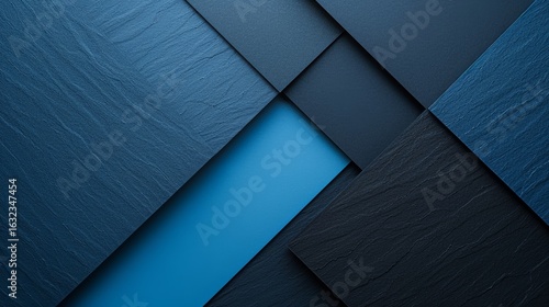 Various textured panels in shades of blue and black are creatively arranged, showcasing a modern design aesthetic