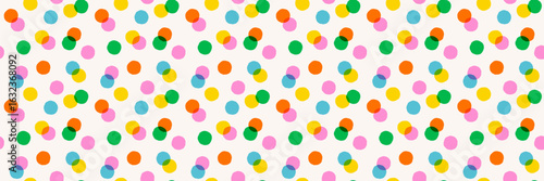 Colorful polka dot pattern background with overlapping circles in pink, green, orange, yellow and blue on a light background. Confetti pattern design for fabric, wrapping, wallpaper. Drag to swatches.