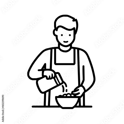 Man in apron pouring liquid from container into bowl with food preparation in a kitchen setting depicted