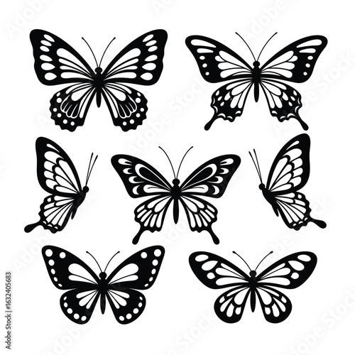 Collection of black butterfly silhouettes on a white background