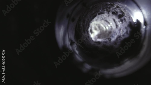 Close-up image of lint buildup inside a dryer vent, highlighting a common household fire hazard. The photo shows accumulated dust, fibers, and debris in the vent pipe, emphasizing the importance of re
