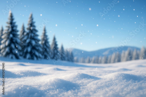 Wallpaper Mural Snowflakes fall gently over a serene winter landscape with evergreen trees and white snow-covered hills under a clear blue sky Torontodigital.ca