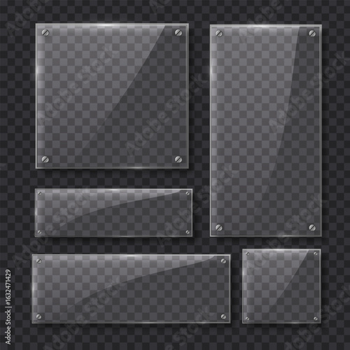 Set of translucent glass panels of varying rectangular and square shapes with metal mounting screws on dark gray checkered background, showing reflections, gloss, and transparency