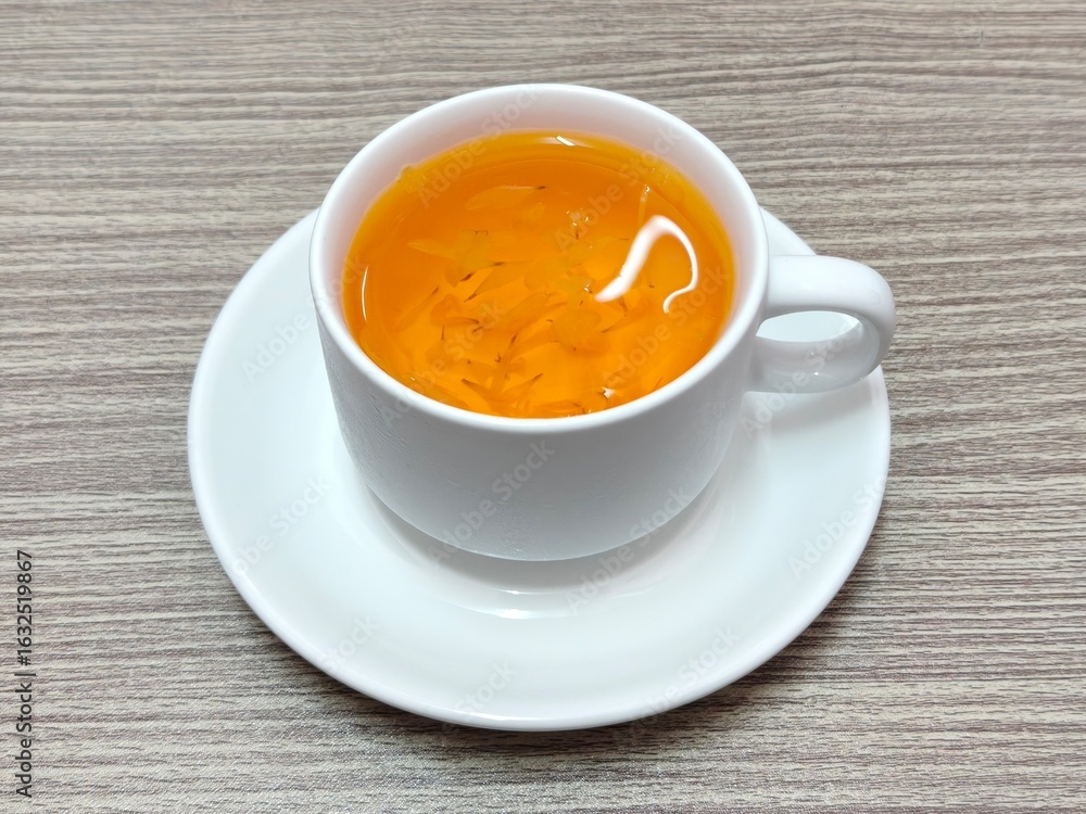 Cup of Chrysanthemum tea. Flowering tea. Herbal tea Cup of Chrysanthemum tea. Flowering tea. Herbal tea
